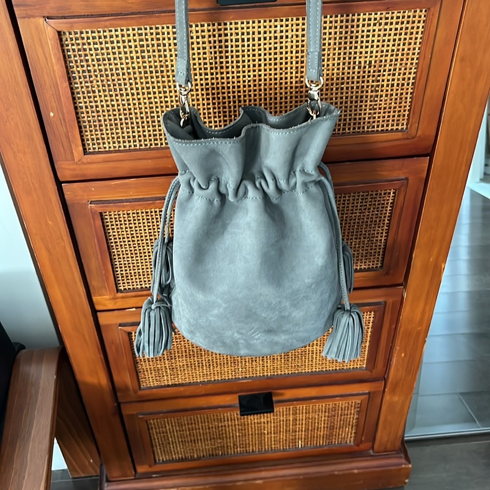 Grey nubuck suede bucket crossbody drawstring bag